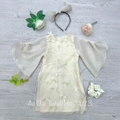 Áo Dài Màu Trắng Dính Nơ Cho Bé Diện Tết